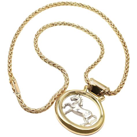 hermes horse necklace.